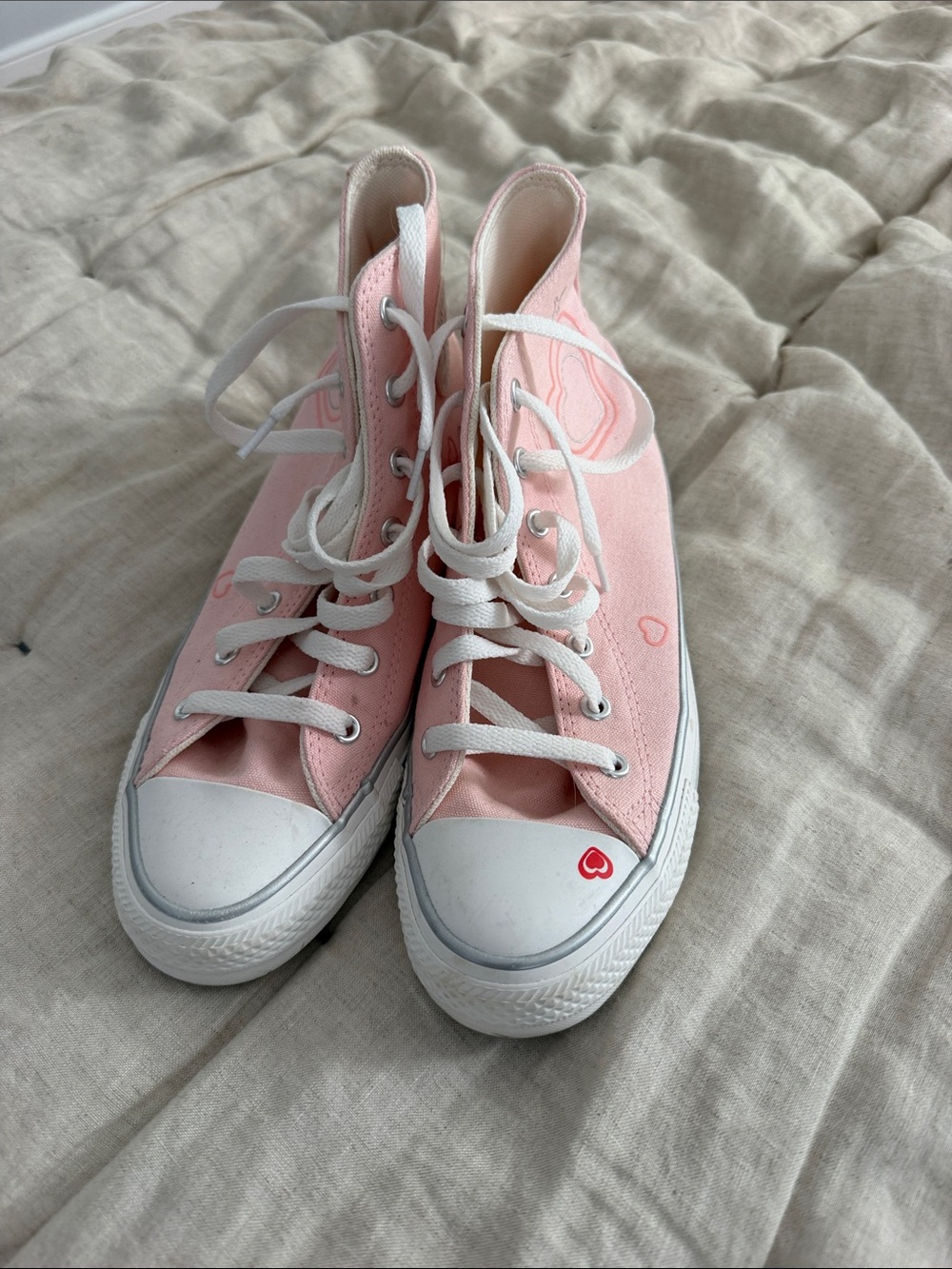 Pink High-Top Converse Sneakers with Heart Accent